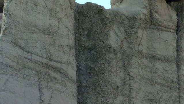 Mudrock Wall With Rock Formations On Top At Ah Shi Sle Pah Wilderness