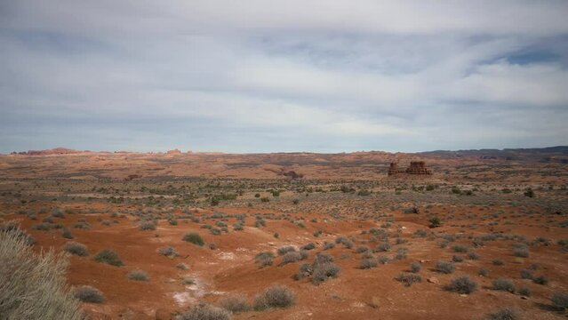 Petrified Dunes in Arches National Park from the overlook on a cloudy day, pan