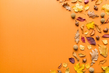 Autumn composition. Pattern made of dried leaves and other design accessories on table. Flat lay, top view