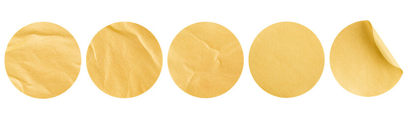 five gold round stickers on a white isolated background