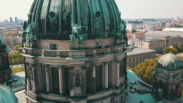 Berlin Cathedral Church - main evangelical church on Museum Island in the Mitte borough in Berlin, Germany, called Berliner Dom. 4K Aerial Panorama of European Capital Cityscape