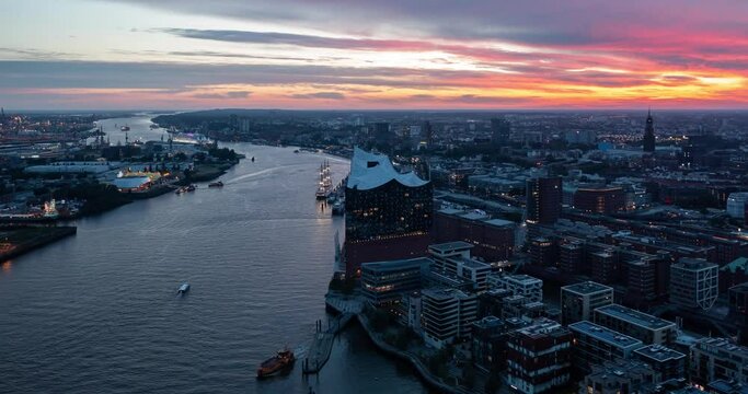A summer sunset in Hamburg, Germany. Aerial view on Hamburg Elbphilarmonie and port. Time Lapse.