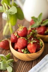 Strawberries in wood plate. Summer life. 