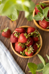 Strawberries in wood plate. Summer life. 