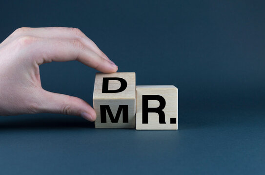 Dr. or Mr. The cubes form the words Dr. or Mr. Mister or Doctor.