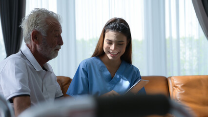 The doctor explains the results of the physical examination and health care program to elderly patients with symptoms of depression. and other complications