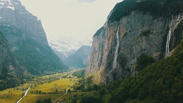 Lauterbrunnen waterfalls. Flying to the valley - Aerial 4K