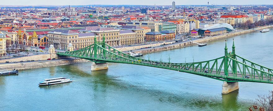 Panorama of Danube River, Liberty Bridge and Corvinus University, Budapest, Hungary