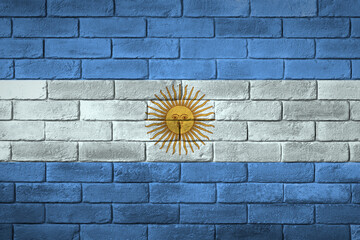 Argentina flag painted on a brick wall.
Flaga Argentyny namalowana na ścianie z cegły.