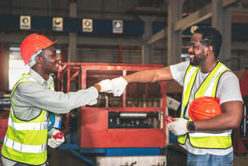 2 African American man Used hand for fist bump to show their cooperation For success teamwork, with...