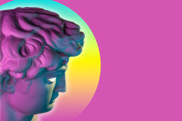 Antique sculpture of head statue David in bright neon colors. Creative concept collage with face statue youth David by Michelangelo. Contemporary art poster. Funky punk design for dj, fashion, zine.