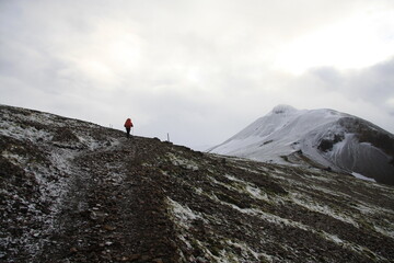 hiker on top of mountain