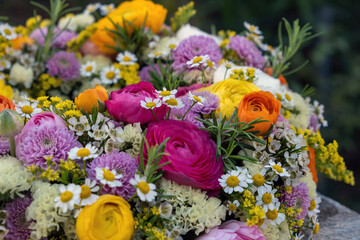 Fresh wild flower and herb bouquet close up. Garden nature and Spring. Women or Mothers day bouquet