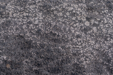 Fototapeta na wymiar black resin background with gray spots