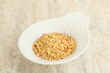 Crunched roasted peanut in the bowl