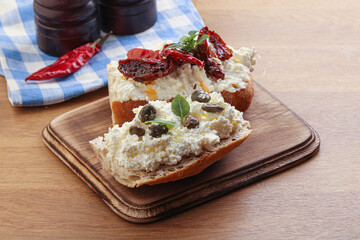 bruschetta with soft cheese capers and tomato
