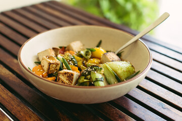 Healthy Vegan Budha Bowl with healthy Tofy, Brocolli, and mixed vegetables