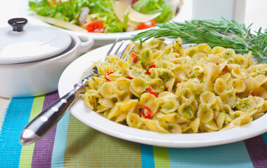 Delicious pasta with pesto sauce in a plate