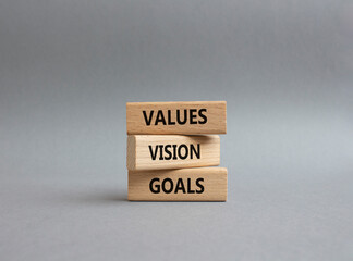 Values Vision Goals symbol. Concept words Values Vision Goals on wooden blocks. Beautiful grey background. Business and Values Vision Goals concept. Copy space.