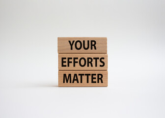 Naklejka premium Your Effort Matter symbol. Wooden blocks with words Your Effort Matter. Beautiful white background. Business and Your Effort Matter concept. Copy space.