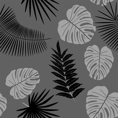 Abstract monochrome background from leaves. Beautiful seamless paper art illustration with tropical palm leaves background. Leaf pattern. Natural flower pattern.
