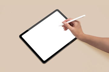 Mockup of new version tablet in trendy thin frame design with white screen with hands on solid...
