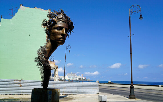 Havana, Cuba, circa May 2022: Modern art at a run down buildung at havanas malecon