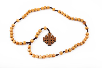 Traditional wooden christian holy religious rosary isolated on white background