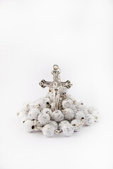 Traditional christian holy religious white rosary isolated on white background.