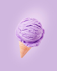 Blueberry ice cream with cone isolated on purple background