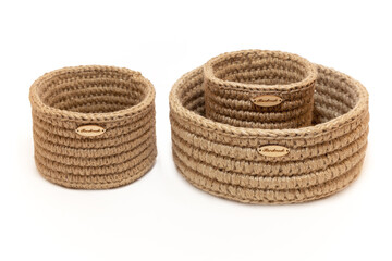 set of hand knitted jute boxes of different sizes, interior and accessory baskets, cute cozy home, order and storage, zero waste