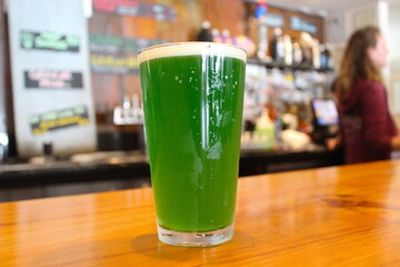 Green beer on a bartop
