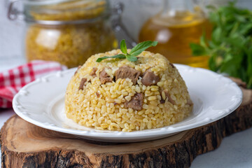 From traditional delicious Turkish cuisine; Bulgur pilaf with meat (Turkish name; etli bulgur pilavi)