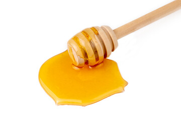 Honey with honey dipper isolated on white background.