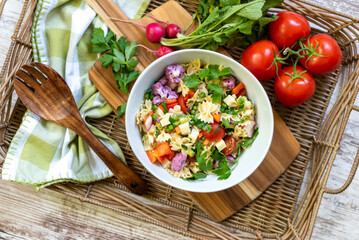 Cold pasta salad with fresh vegetables