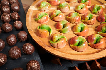 chocolates on a stone tray of a catering candy bar