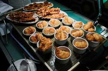 meat in batter and beef on the catering table in the restaurant