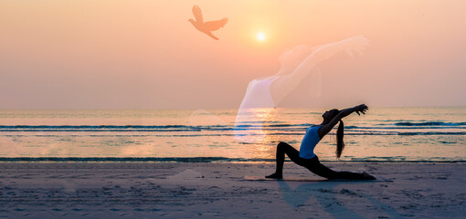 Spiritual young woman doing yoga on the beach.