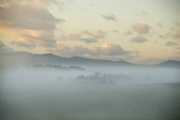 Fototapeta premium Mist inversion in the woods and mountains during autumn and winter. Slovakia