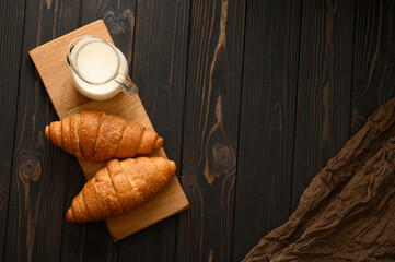 Fresh croissants with milk