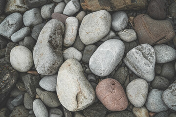 Fototapeta na wymiar Large pretty stones on the beach