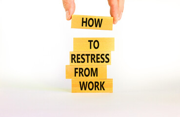 Restress from work symbol. Concept words How to restress from work on wooden blocks. Doctor hand. Beautiful white background. Psychological business and restress from work concept. Copy space.