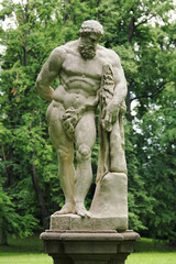 Old statue of Hercules in the park.