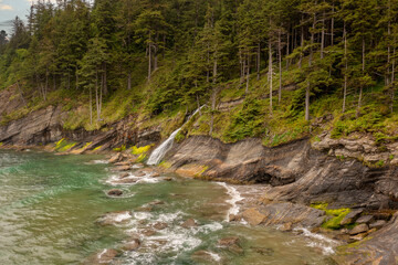 Oswald State Park Waterfall. Stretching along four miles of coastline in dense, temperate...
