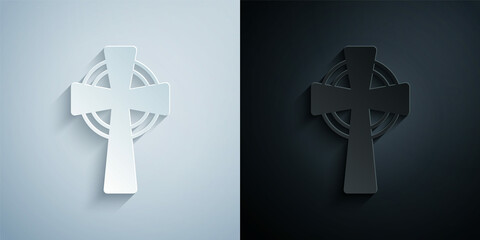 Obraz premium Paper cut Celtic cross icon isolated on grey and black background. Happy Saint Patricks day. National Irish holiday. Paper art style. Vector
