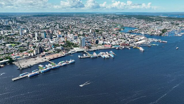 Downtown Manaus Brazil. Capital city of Amazonas State near Amazon river and Amazon forest. Tropical destination. Tropical travel. Tourism landmark.  Outdoors urban scenery downtown Manaus Brazil.