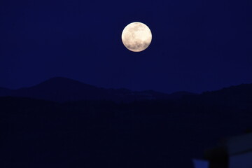 Fototapeta na wymiar Beautiful full moon in corfu island, Greece