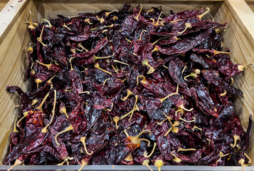 Dried Organic California Chiles for sale in the supermarket produce section from above