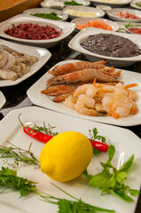 .Shrimp-based dish with various herbs and spices.