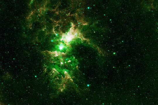 Green galaxy in deep space. Elements of this image furnished by NASA